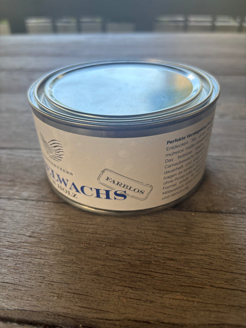 Möbelwachs, farblos, 375g, zeigt eine offene Wachsdose mit Wachs und Bürste.
