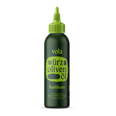 Vola Würz Olivenöl mit Basilikum in einer transparenten Flasche, frisches Basilikum im Bild, ideal für mediterrane Gerichte